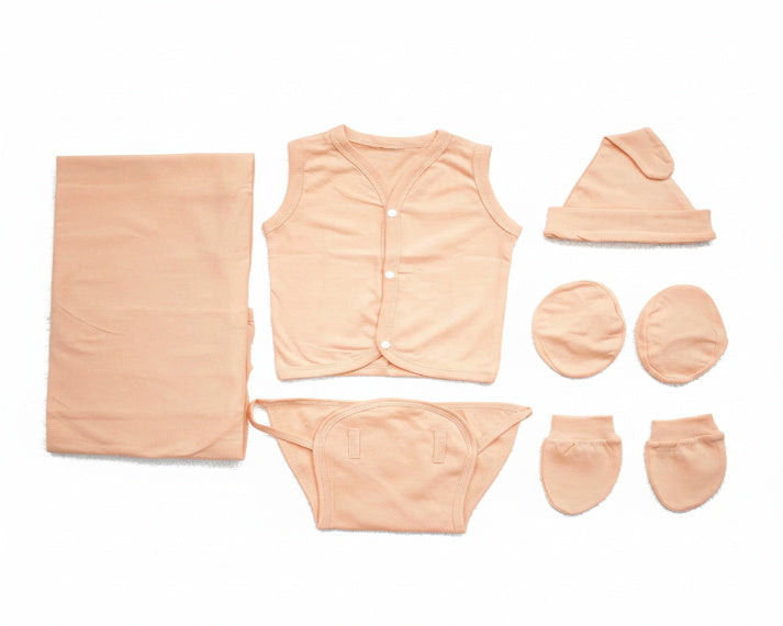 Baby clothing set including a vest, hat, diaper, socks, and blanket on a white background