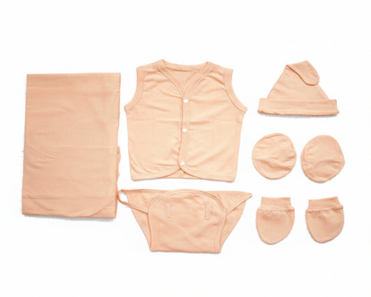 Baby clothing set including a vest, hat, diaper, socks, and blanket on a white background